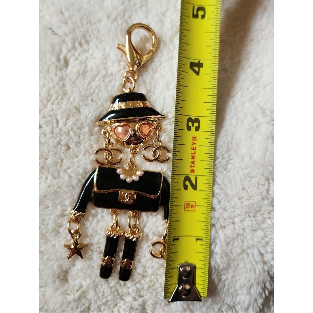 CHANEL Black and Gold Enamel Charm Doll with Pink Heart Sunglasses - Picture 5 of 7